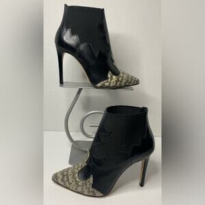 Francesco Sacco black ankle boot with reptile design on the toe